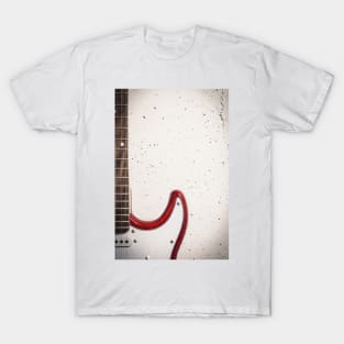 Red electric close-up against white raw wall T-Shirt